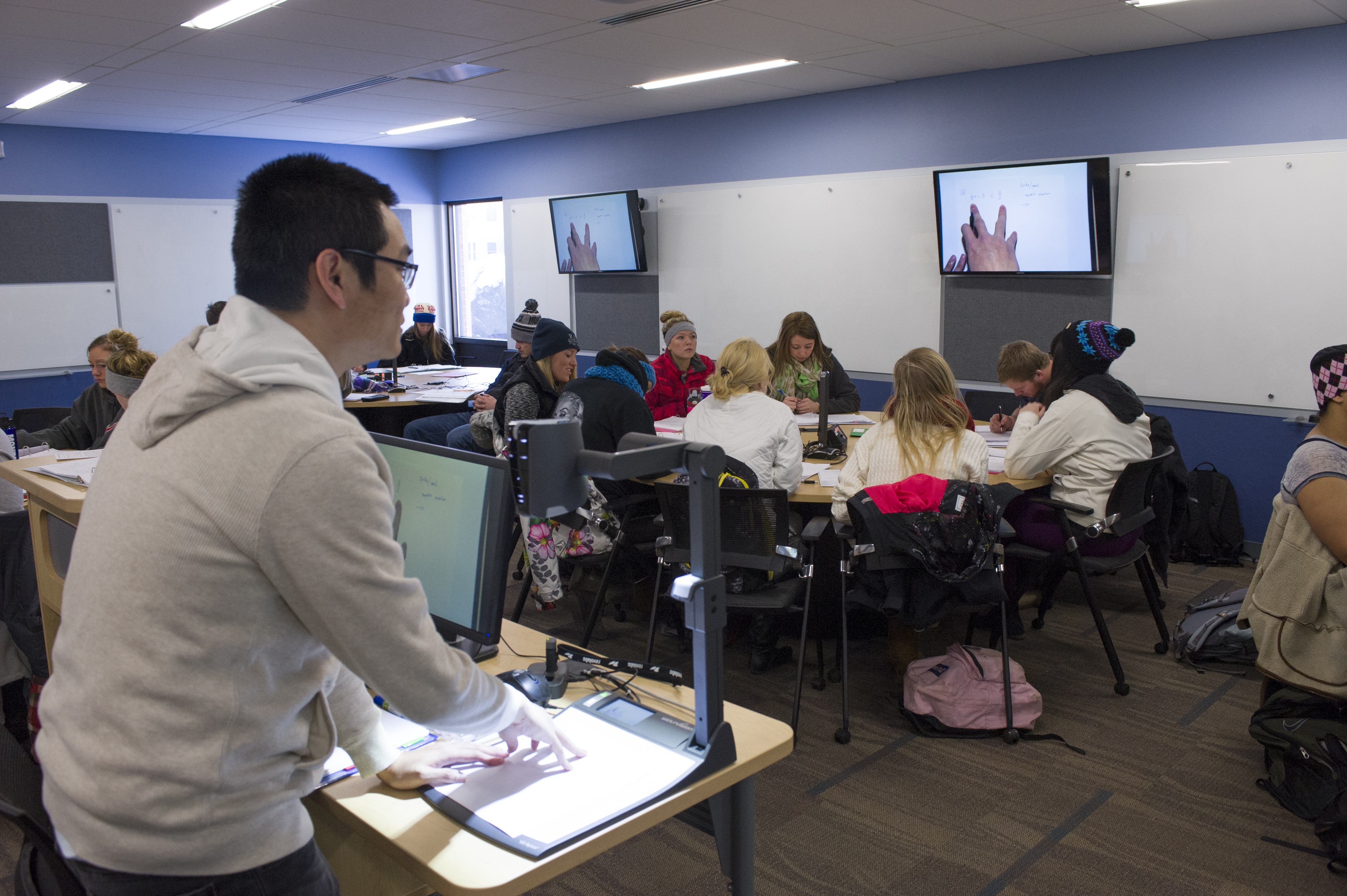 Tran Tan teaching a course